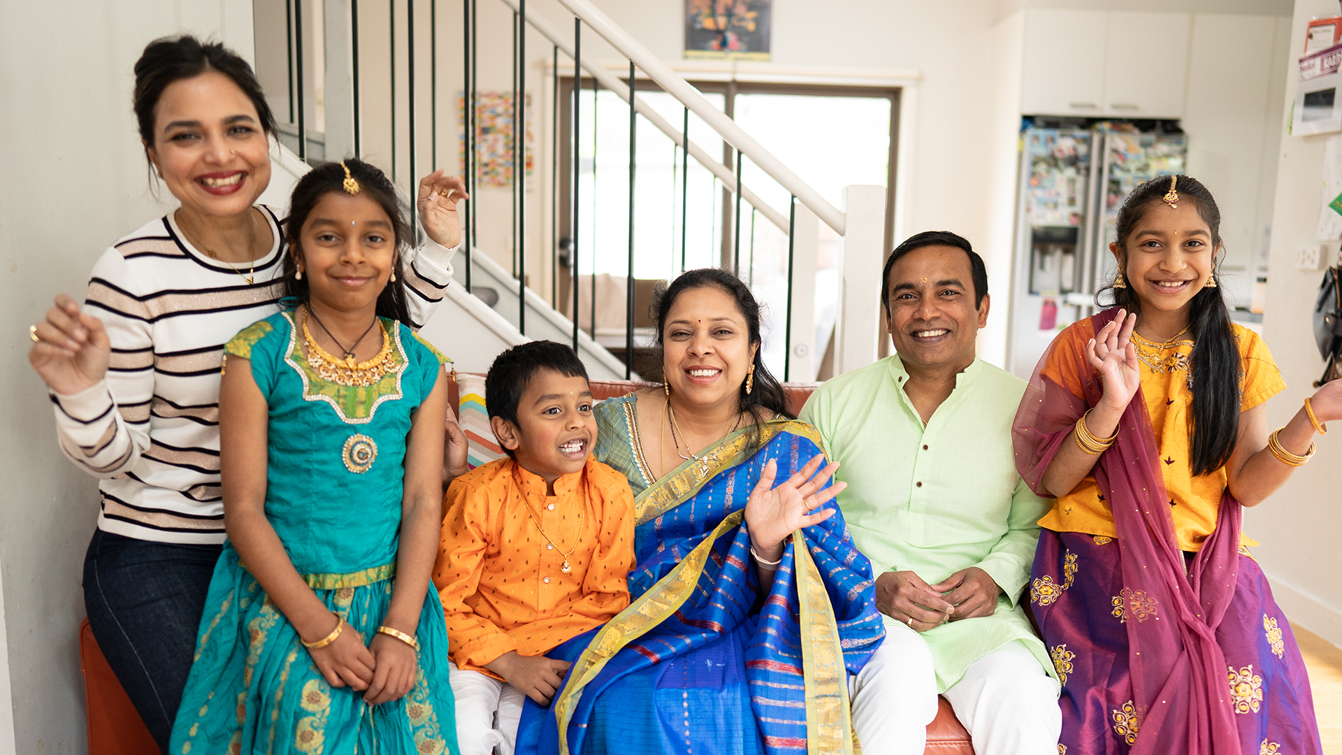 The Nara family featured in the Diwali video series hosted by celebrity chef Kishwar Chowdhury (pictured far left)