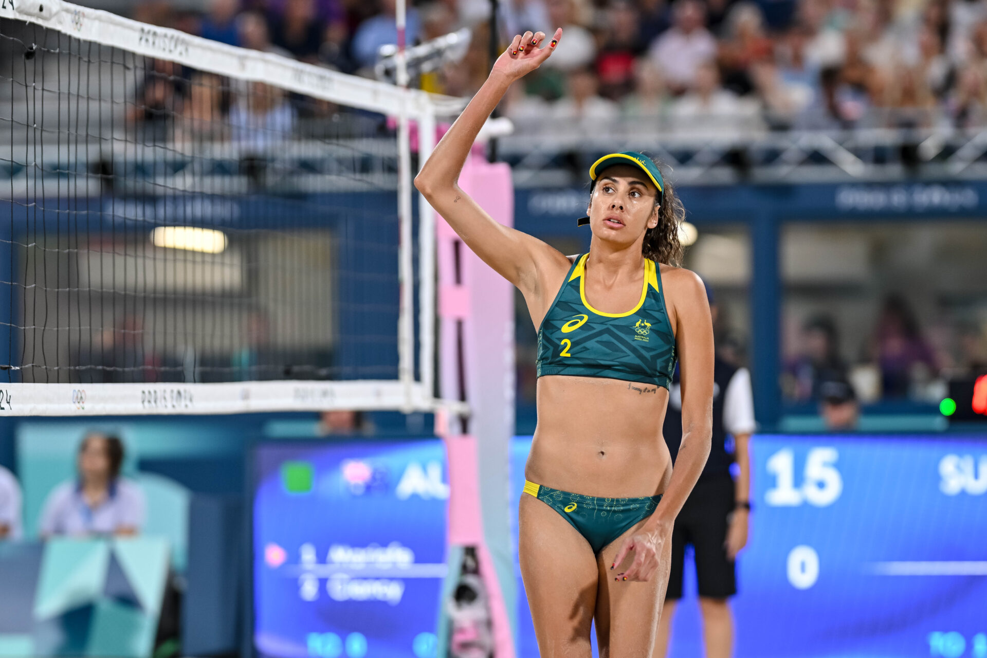 Taliqua Clancy of Australia gestures during the Women's Beach Volleyball Bronze Medal match between Mariafe Artacho del Solar, Taliqua Clancy Australia and Tanja Hueberli Nina Brunner Switzerland on Day 14 of the Olympic Games Paris 2024 at Eiffel Tower Stadium on August 9, 2024 in Paris, France. (Photo by Harry Langer/DeFodi Images via Getty Images)