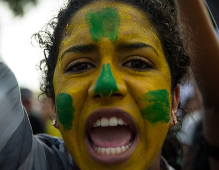 9873_womanchanting-170949005-afp-getty.jpg